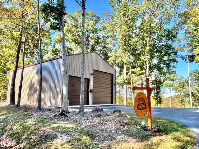 view of outbuilding featuring a garage