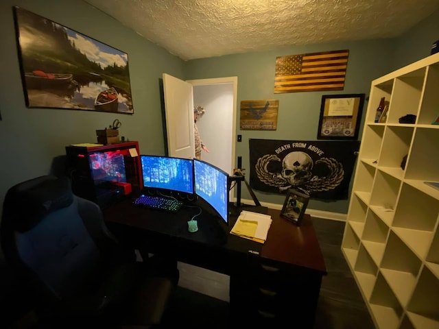 office area with a textured ceiling