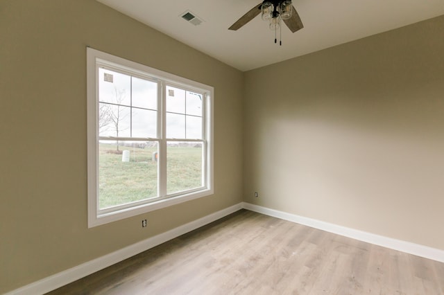 unfurnished room featuring ceiling fan and light hardwood / wood-style flooring