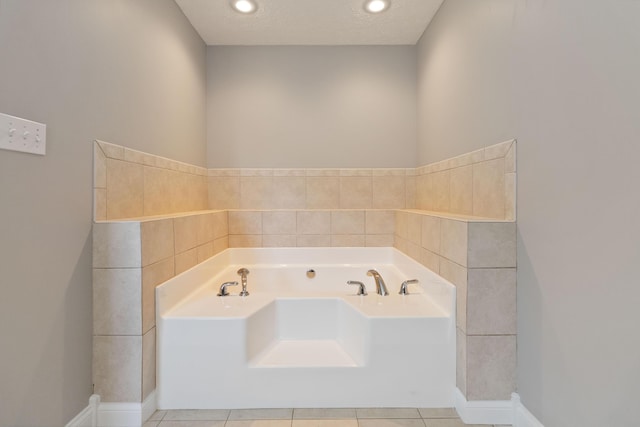 full bathroom featuring recessed lighting, tile patterned flooring, and a bath