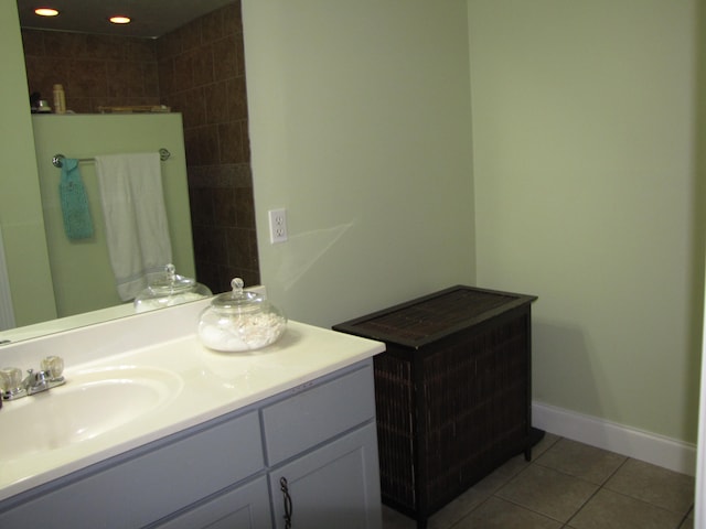 bathroom featuring tile patterned floors and vanity