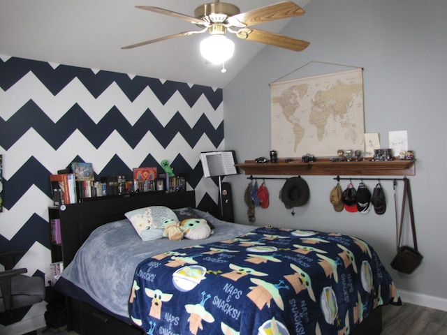 bedroom featuring lofted ceiling, dark hardwood / wood-style floors, and ceiling fan