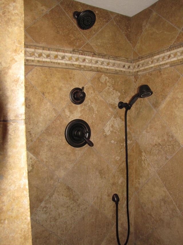 details with a tile shower