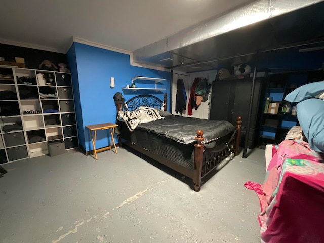 bedroom featuring crown molding