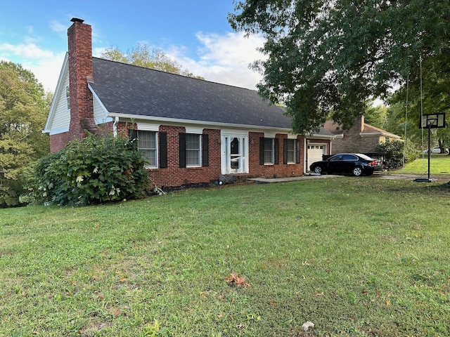 view of front of home featuring brick siding, a front yard, an attached garage, and roof with shingles