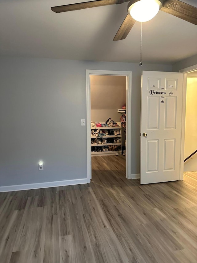 unfurnished room with hardwood / wood-style floors