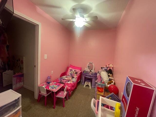 carpeted bedroom featuring ceiling fan