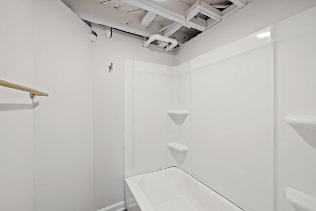 bathroom featuring washtub / shower combination