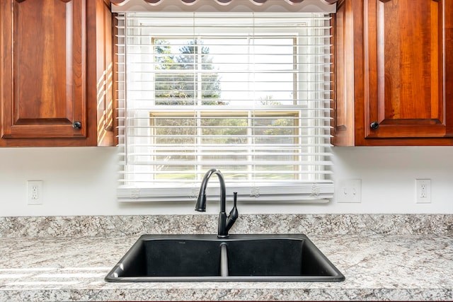 kitchen with plenty of natural light and sink