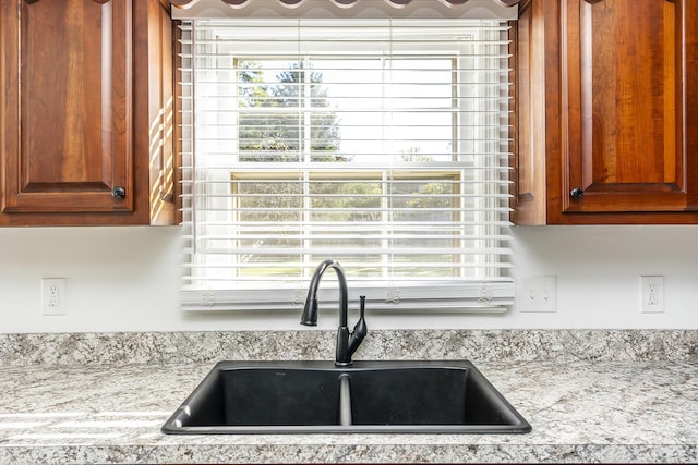 kitchen with a sink and plenty of natural light