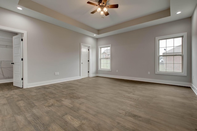 233 Iva Dr, Richmond, KY 40475 - empty room featuring ceiling fan, a tray ceiling, and hardwood / wood-style floors