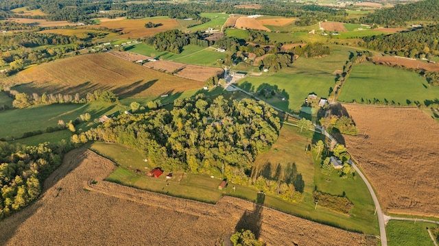 birds eye view of property featuring a rural view