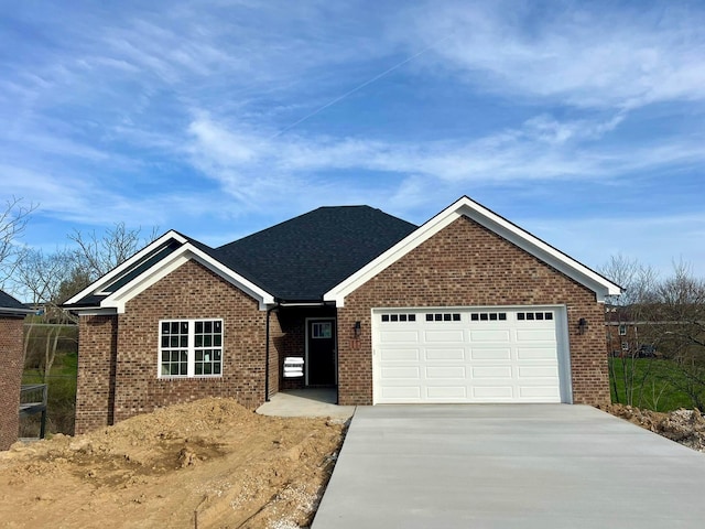 view of front of home with a garage