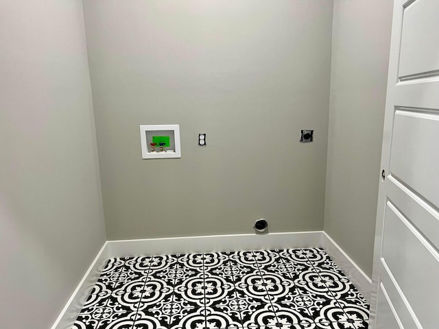 washroom with washer hookup, tile patterned flooring, and hookup for an electric dryer