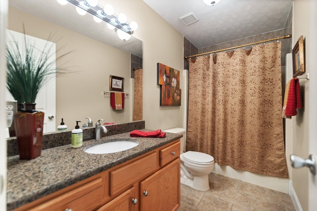 full bathroom featuring vanity, shower / tub combo, and toilet