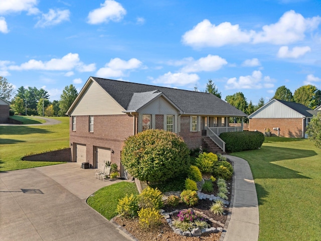 view of front of home with a garage and a front yard