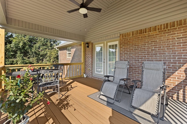 wooden deck with ceiling fan