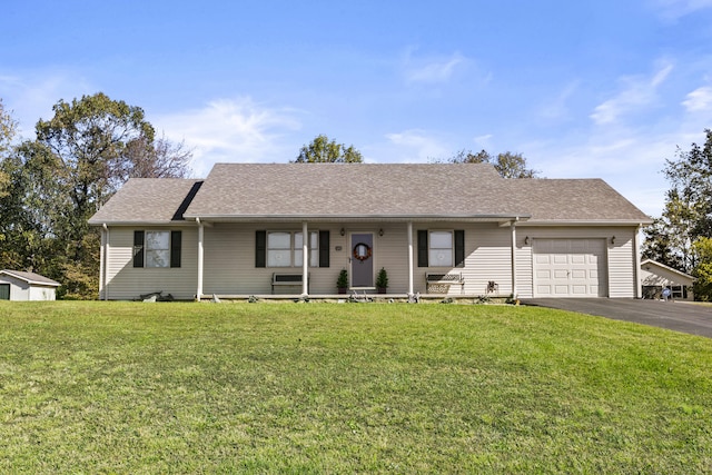 ranch-style house with a front yard, a porch, a garage, aphalt driveway, and roof with shingles
