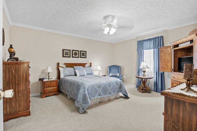 bedroom featuring light carpet, crown molding, a textured ceiling, and ceiling fan