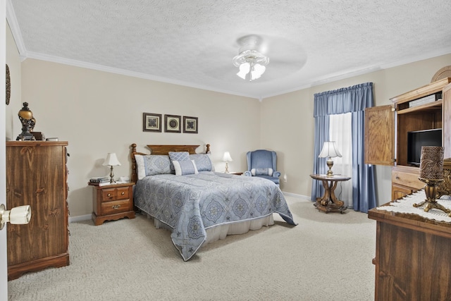 bedroom featuring a textured ceiling, a ceiling fan, ornamental molding, light carpet, and baseboards
