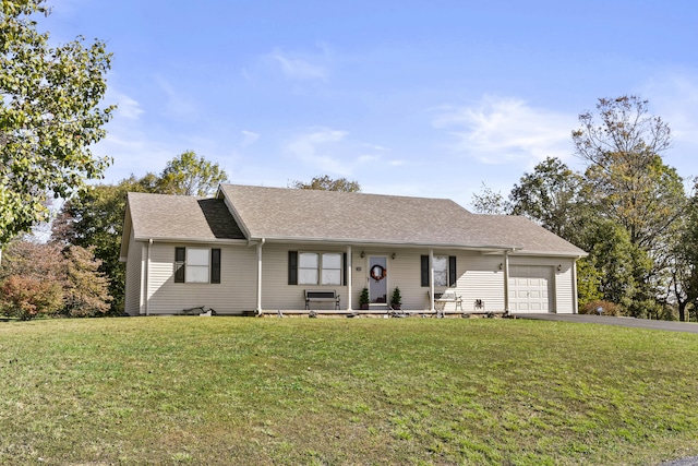 ranch-style house with a front lawn and a garage