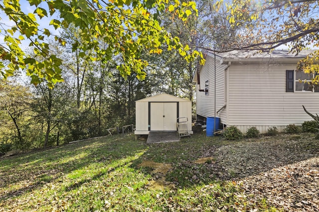 exterior space featuring a shed and an outdoor structure