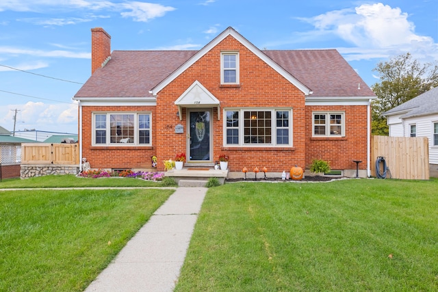 view of front facade with a front yard