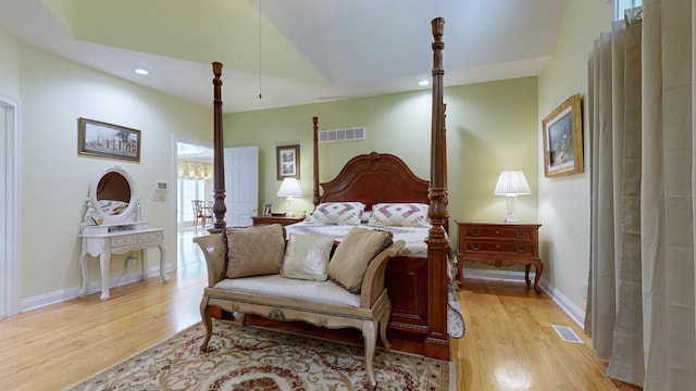 bedroom with light hardwood / wood-style floors