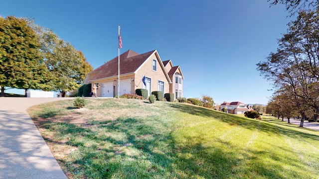 view of property exterior featuring a lawn and a garage