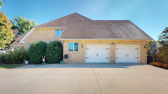 exterior space with a garage