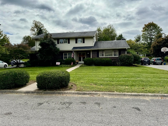 front of property featuring a front lawn