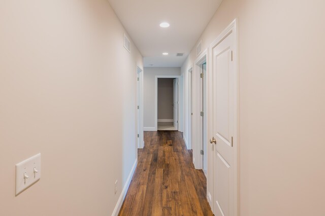 entryway with dark hardwood / wood-style floors