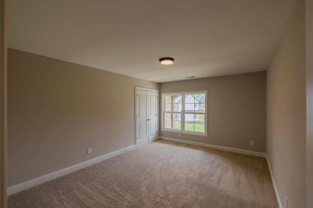 view of carpeted empty room