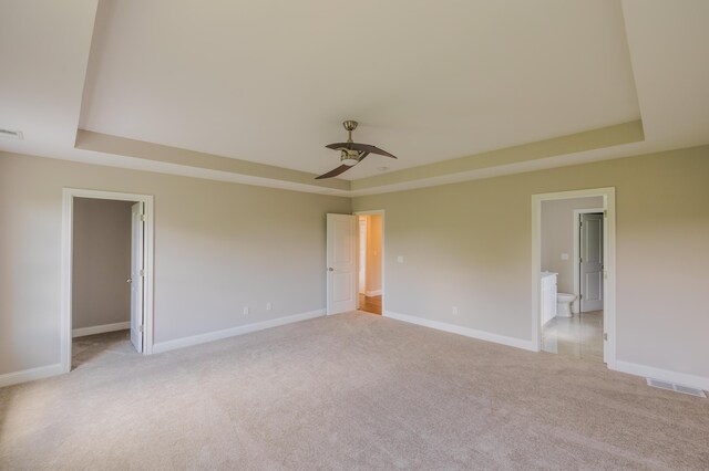 unfurnished room featuring light colored carpet