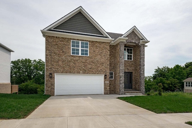 view of front of house with a front lawn and a garage