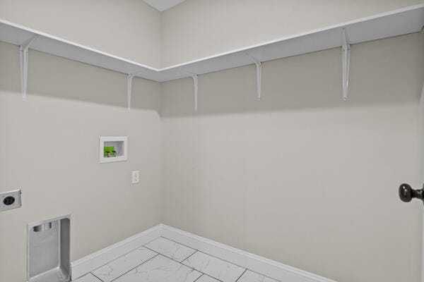washroom with laundry area, electric dryer hookup, marble finish floor, washer hookup, and baseboards