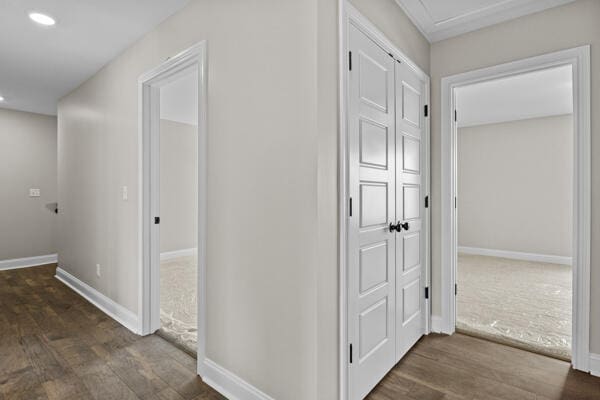hall with recessed lighting, baseboards, and dark wood finished floors