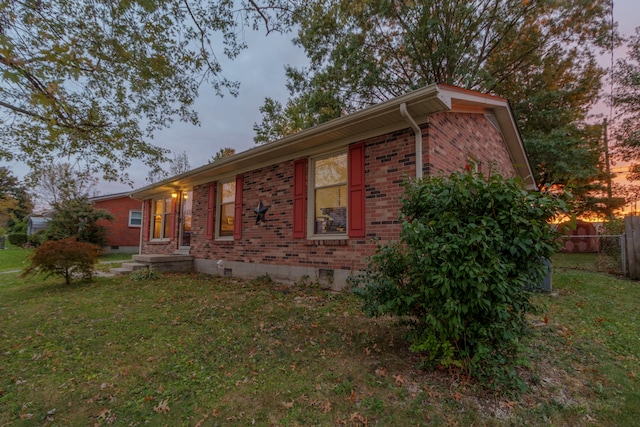 exterior space with a lawn