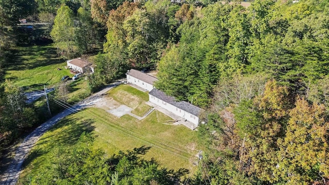 aerial view featuring a view of trees