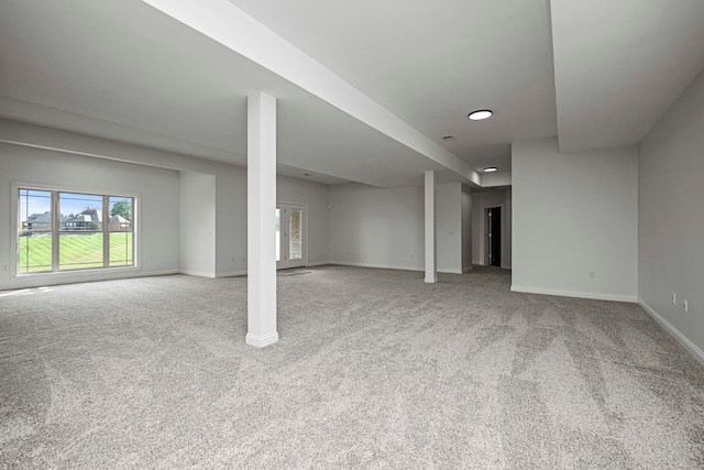 basement with light carpet