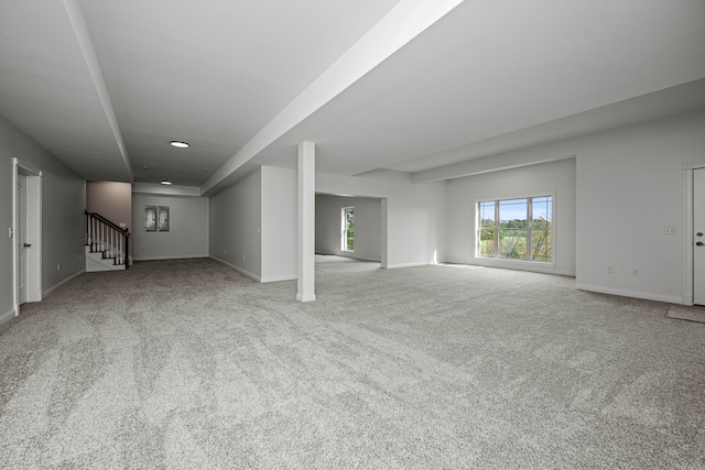 basement with light colored carpet