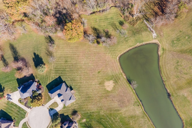 birds eye view of property featuring a rural view and a water view