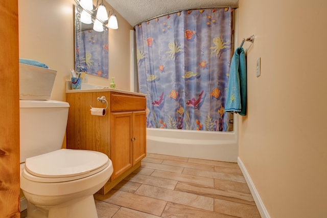 full bathroom with hardwood / wood-style floors, vanity, toilet, a textured ceiling, and shower / tub combo with curtain