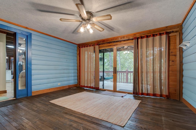 unfurnished sunroom with ceiling fan