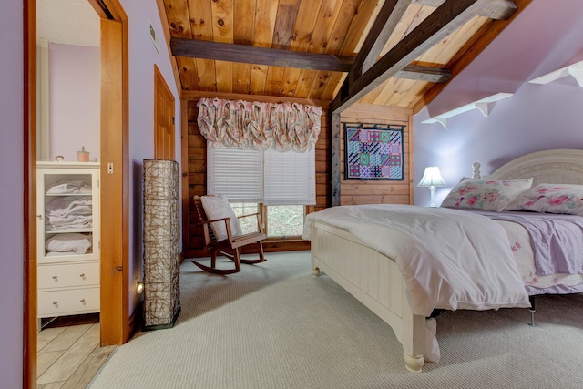 bedroom with vaulted ceiling with beams, wood ceiling, and light carpet