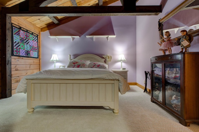 carpeted bedroom with vaulted ceiling with beams