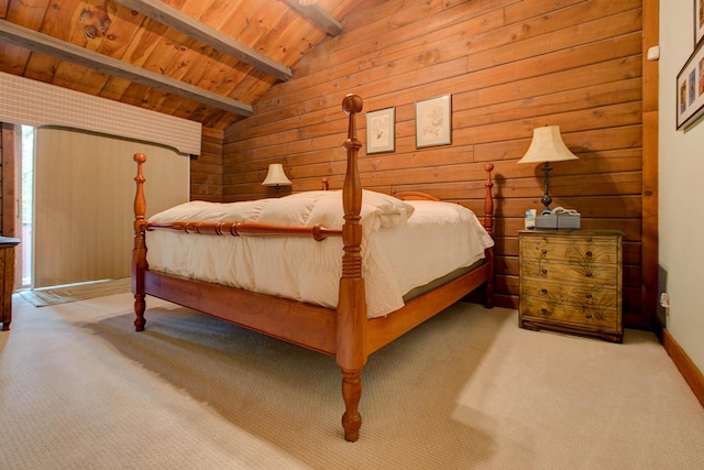 bedroom featuring lofted ceiling with beams, light colored carpet, wood walls, and wood ceiling