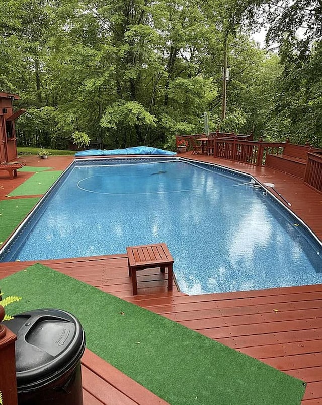 view of pool with a deck