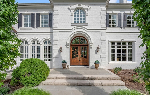 doorway to property with french doors and a patio