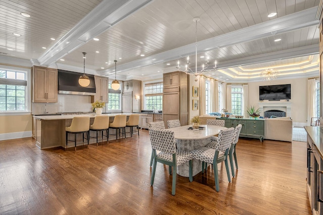 dining space featuring a notable chandelier, wooden ceiling, light hardwood / wood-style flooring, and plenty of natural light